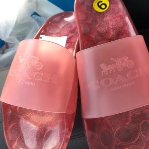 Woman’s size 9 pink coach open toed sandals, brand new with tags never worn